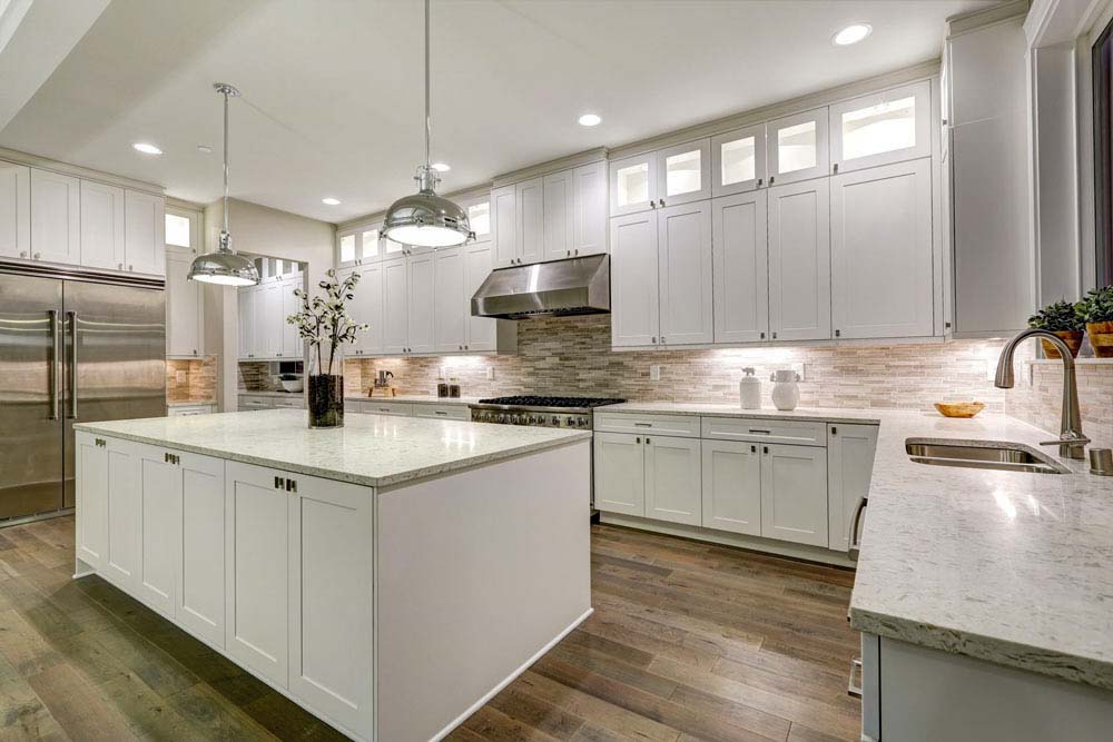 Gorgeous modern looking newly renovated kitchen, granite countertops, ice white shaker cabinet door design installed